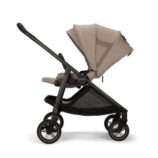 Nuna SWIV Stroller with Magnetic Buckle - Acorn