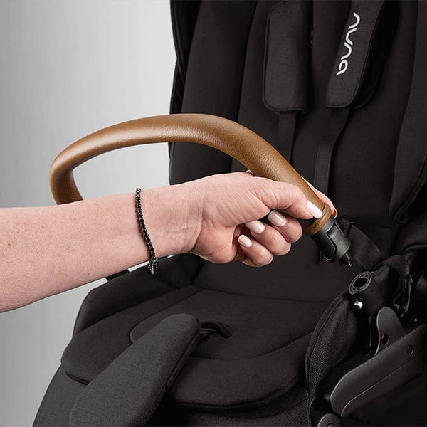 Nuna SWIV Stroller with Magnetic Buckle - Caviar (Black)