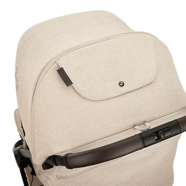 Nuna TRVL lx Compact Stroller with Travel Bag - Mica ( Delicate Neutral Beige BMW Logo)