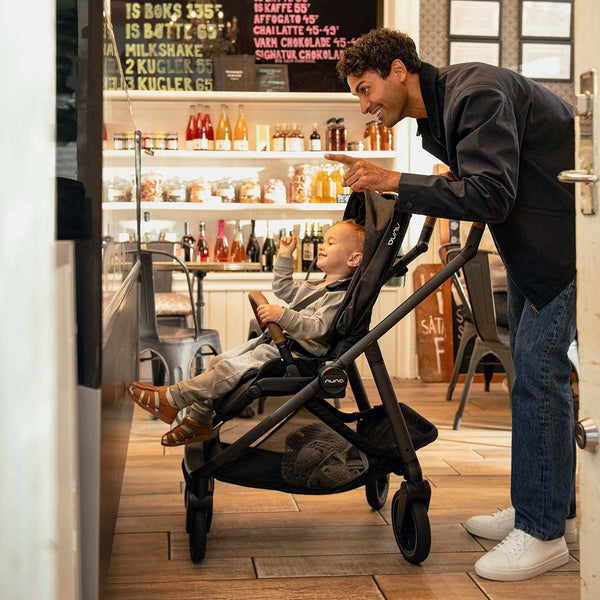Nuna SWIV Stroller with Magnetic Buckle - Cedar