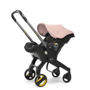 Doona Infant Convertible Car Seat and Stroller - Blush Pink
